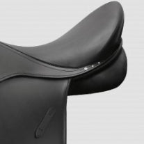 a detail view of a passier dressage saddle with three crystals on the skirting