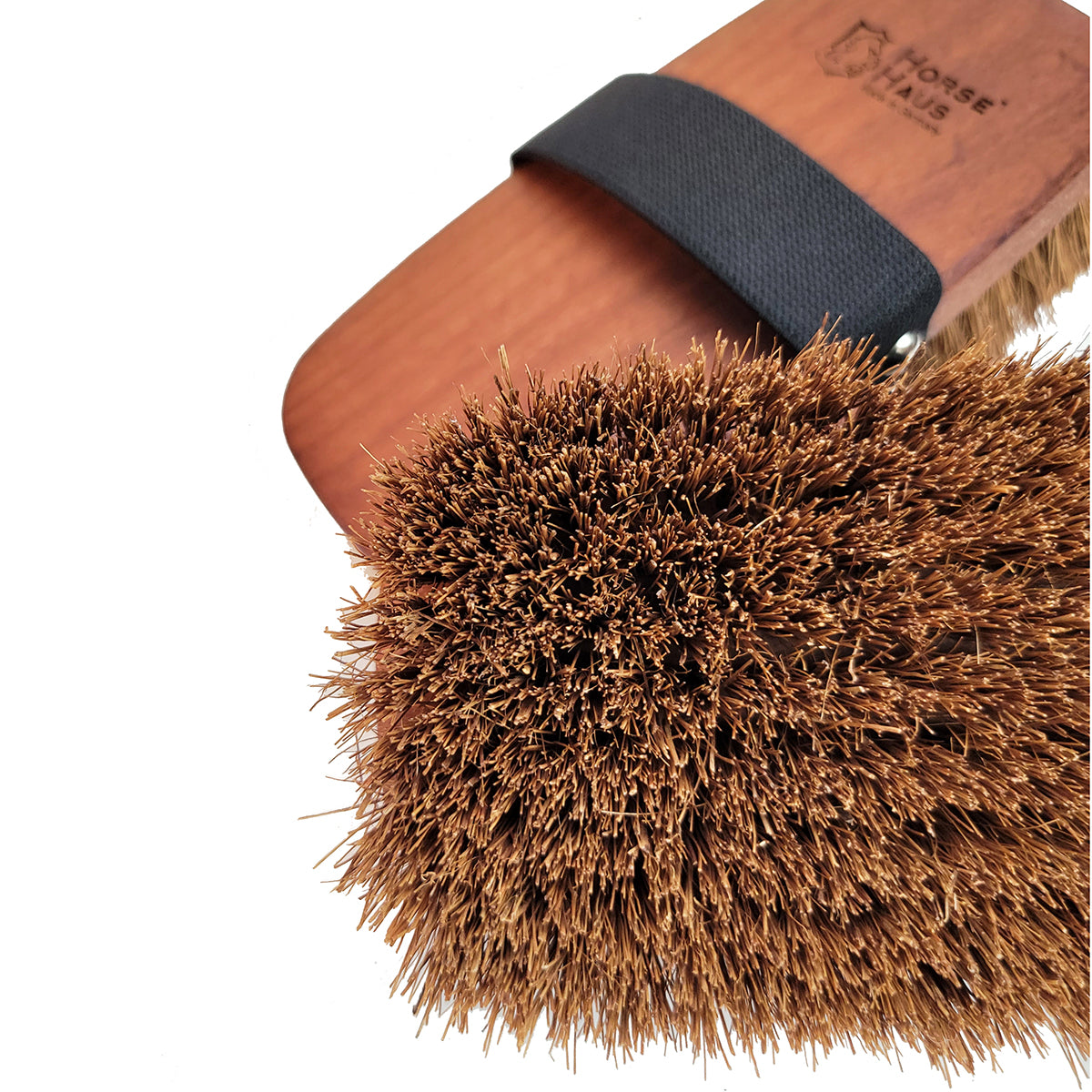 closeup of natural coco fiber horse brush